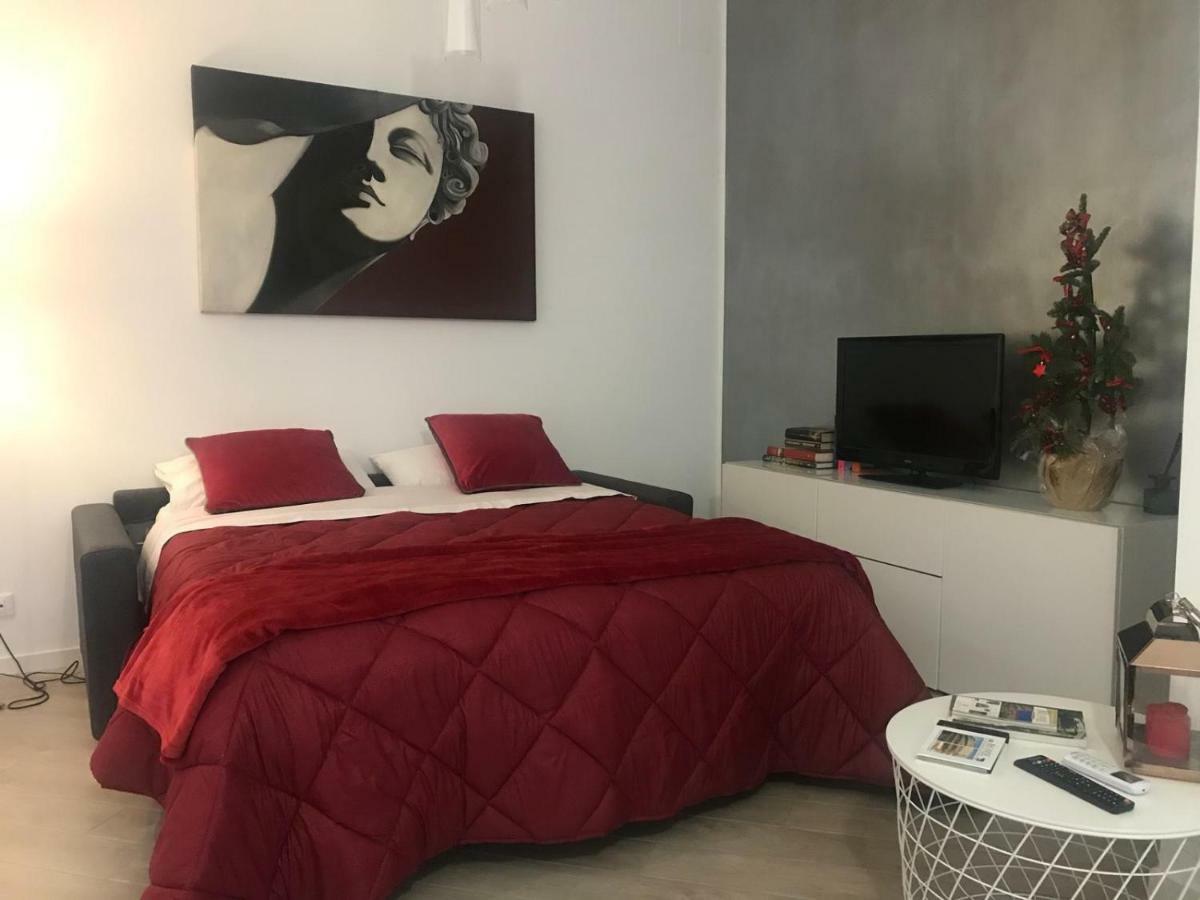 Rhome Merulana Rome Luaran gambar